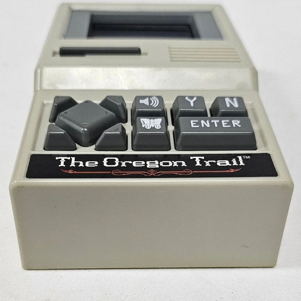 Basic Fun The Oregon Trail Handheld Electronic Game Retro 09597 Tan Color Screen